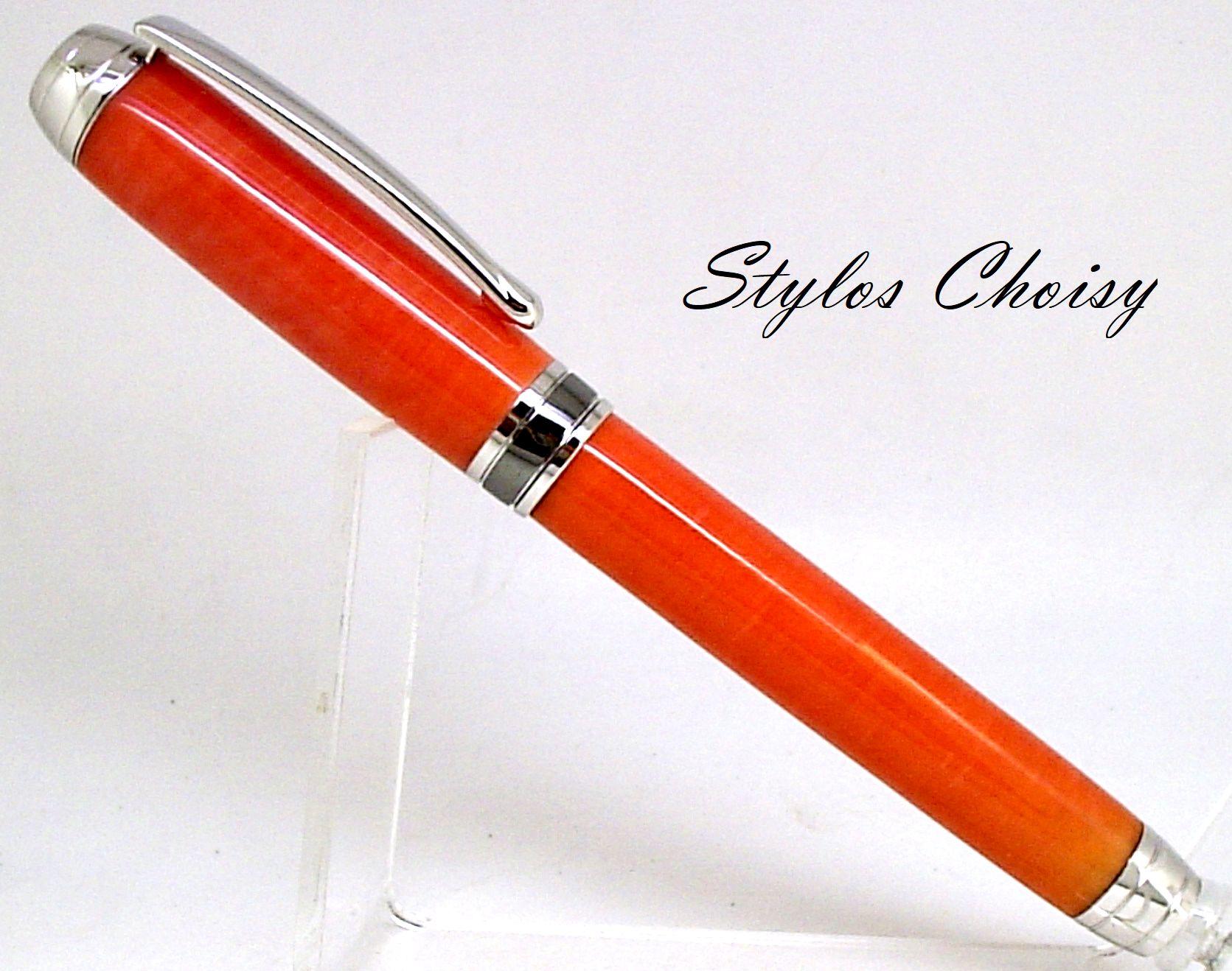 Roller serenite galalithe orangee platine et titane 1